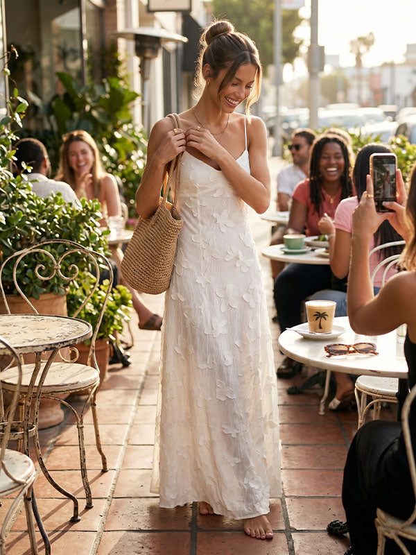 flowing white maxi dress walking movement butterfly appliqué summer light