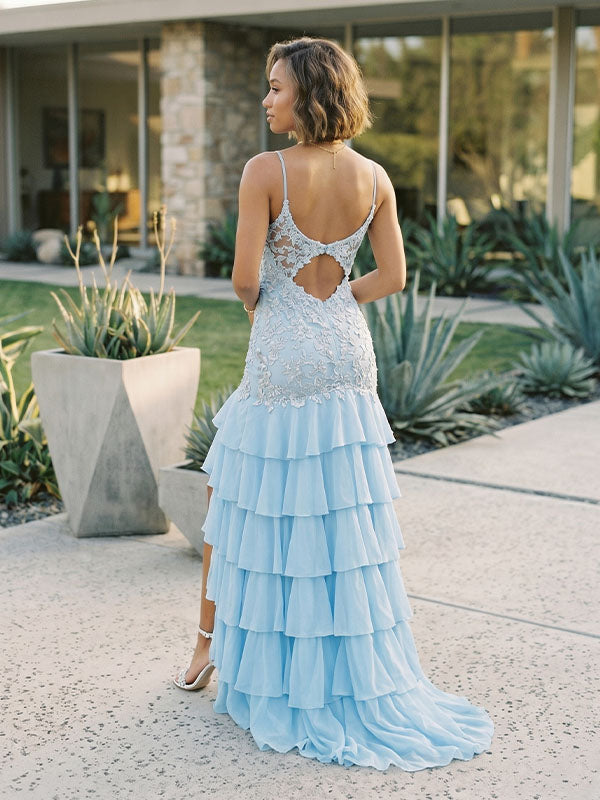 Back view showing the flawless tailoring, structure, and seamless back closure of the textured jacquard evening gown.