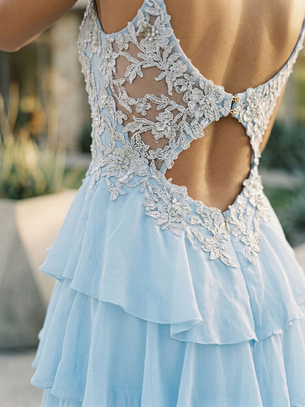 Macro close-up view of the premium heavyweight jacquard material and intricate floral embroidery details of Etherelegown dress.