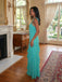Elegant green ruffle gown with low open back and fluid movement

