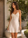 close up floral lace neckline detail on champagne satin slip dress
