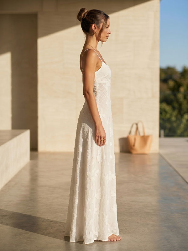woman wearing white butterfly dress garden party outdoor romantic setting