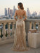 statement back bow golden formal gown rear view